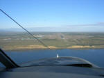 View from the co-pilot's seat - Magellan Strait and Punta Arenas airport
